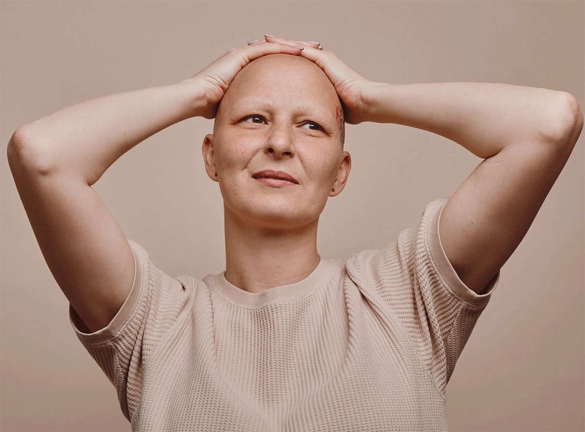 Woman holding her head with confidence