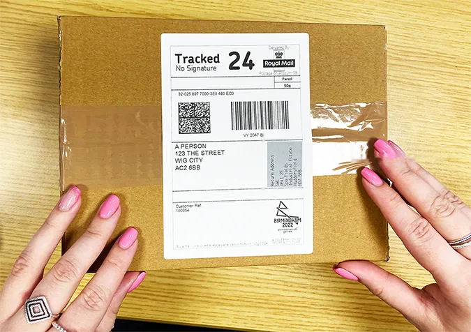 Plain brown parcel with a Royal Mail Tracked 24 label and no branding